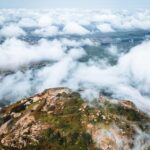 Stunning view of Skandagiri Hill near Bangalore, a popular trekking destination known for sunrise treks, scenic landscapes, and the ancient hilltop fortress.